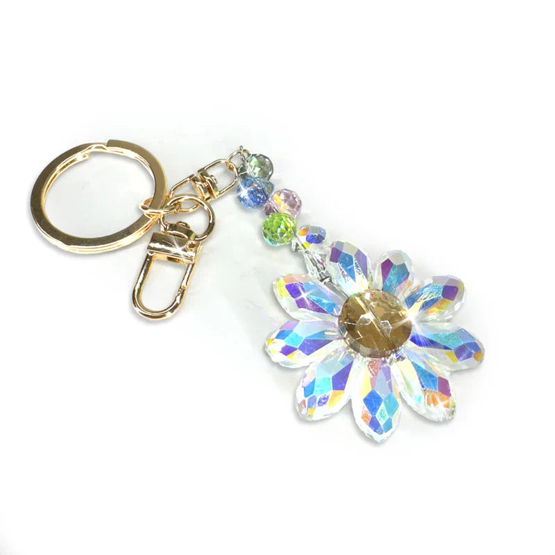 FLOWER POWER COLLECTION CRYSTAL DAISY KEYCHAIN / CHARM | CLEAR / BLUE by Jacqueline Kent