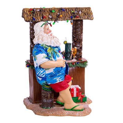Kurt Adler 11" Fabriché™ Beach Santa Sitting At Tiki Bar